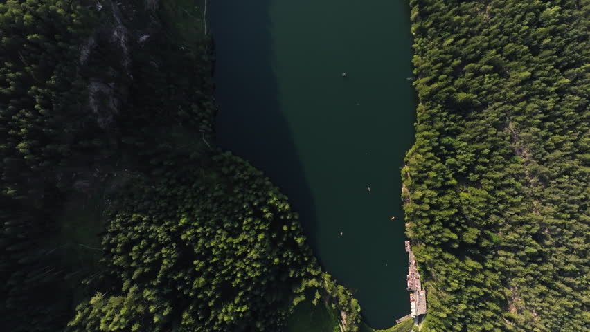 Aerial view of Piburger Lake in Tyrol Austria surrounded by alpine mountains and forests with scenic nature landscape and travel destination in Europe