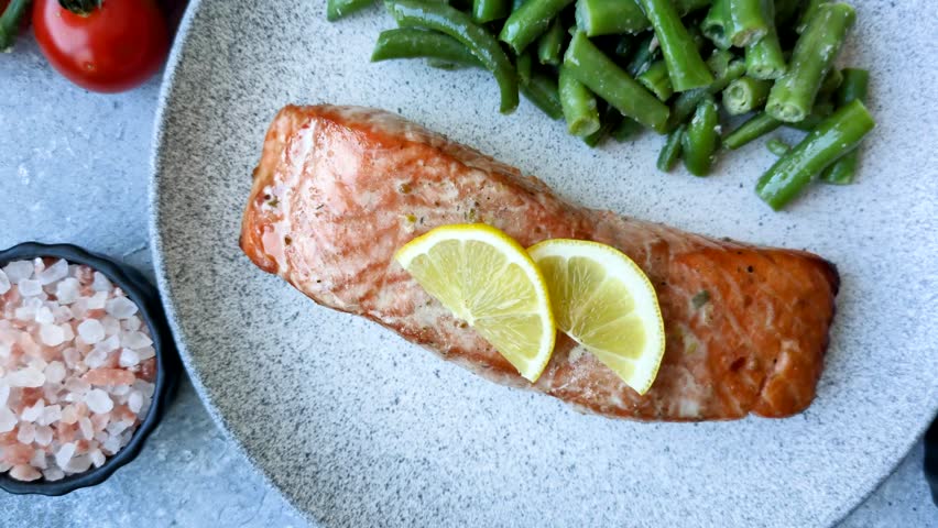 Fish, grilled salmon fillet, healthy food, seafood. Grilled salmon fillet as a background for your design