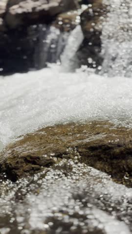 A powerful waterfall cascading through wild nature