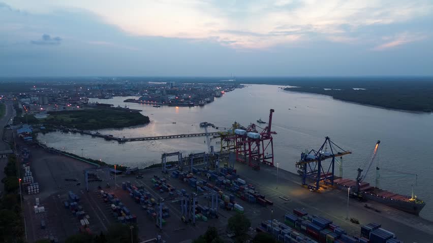 River Port Container Terminal Aerial, Cargo Shipping Logistics and Industrial Harbor Along Waterway