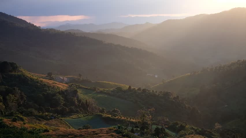 unset over the mountains, photographed at the accommodation near the Bua Tong flower fields.