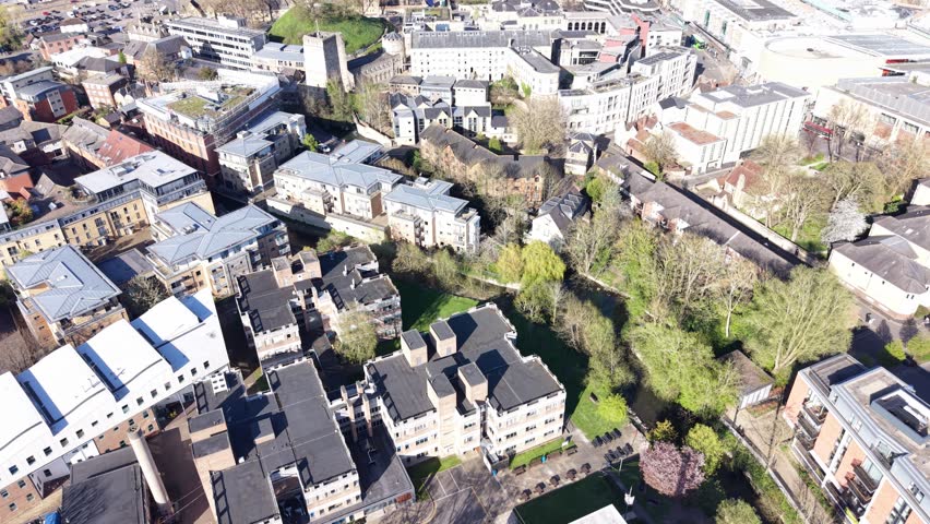 4K drone footage showing the Radcliffe Camera surrounded by historic Oxford streets and university buildings.