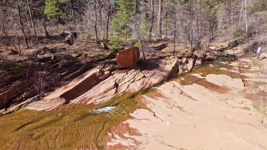 Scenic West Fork Trail follows Oak Creek through red rock canyon landscape near Sedona Arizona