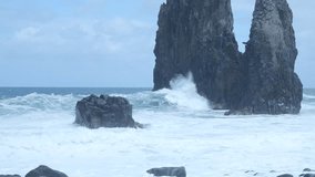 Rough ocean waves crashing against sea stacks - Powered by Shutterstock - Get 15% off with code: PIKWIZARD15