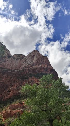 Scenic panoramic view of the Grand Canyon West Rim in Arizona, USA. Desert landscape with layered red rock cliffs, deep canyon formations, Colorado River view. A road trip near Eagle and Guano Point