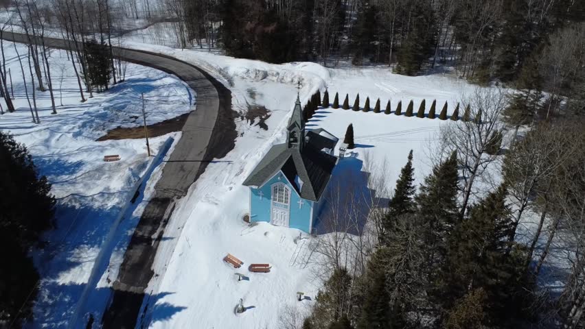 Cinematic winter drone flight circling the Saint Joseph