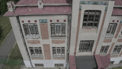 Drone Flying Sideways along Historic Building Facade