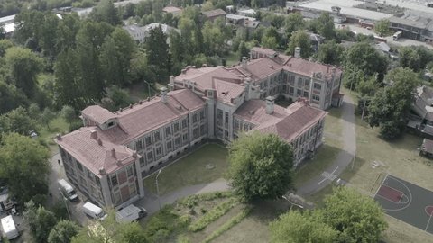 Drone Circling High above Historic Urban Building
