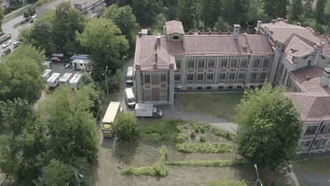 Drone Flying Right over Historic Building Complex