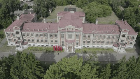 Drone Lowering Front Historic Building Entrance