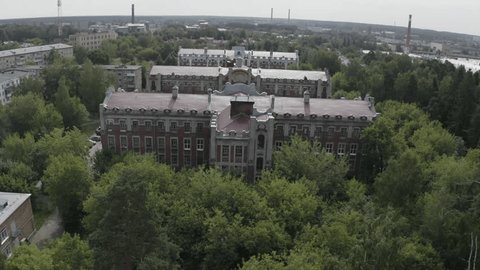Drone Moving Forward above Town Historic Complex