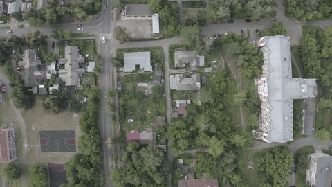 Drone Flying Sideways over Buildings Top View