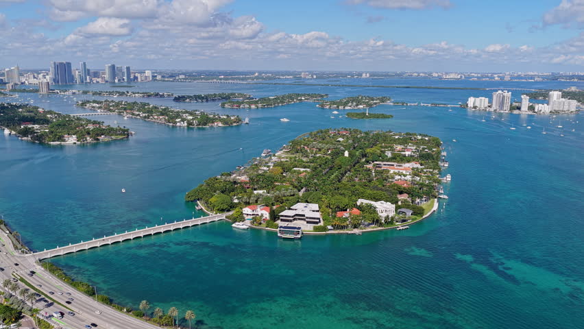Star Island in Miami beach, Florida. Residential buildings in luxury Star island surrounded by sea. Waterfront residential area on Star island, Miami. Florida landscape view. Travel destination