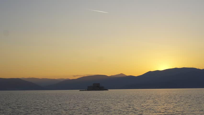 Nafplion bourtzi castle island at sunset in Greece