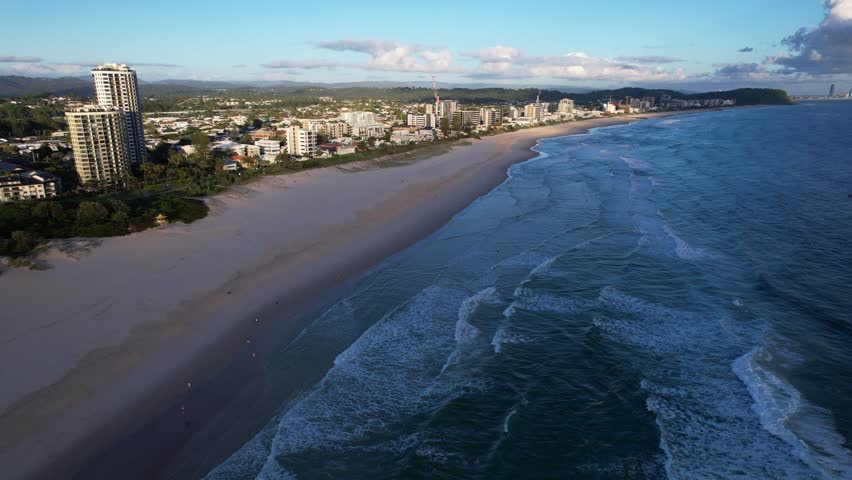 Palm Beach With Beachfront Buildings In Gold Coast, QLD, Australia - Drone Shot