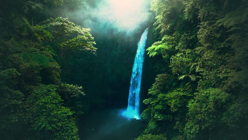 A serene and mystical waterfall cascading down into a deep pool surrounded by lush green foliage