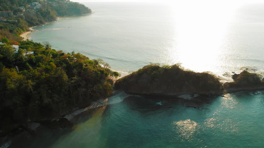 Aerial view of Playa Mantas sandy beach and tropical coastline in Costa Rica