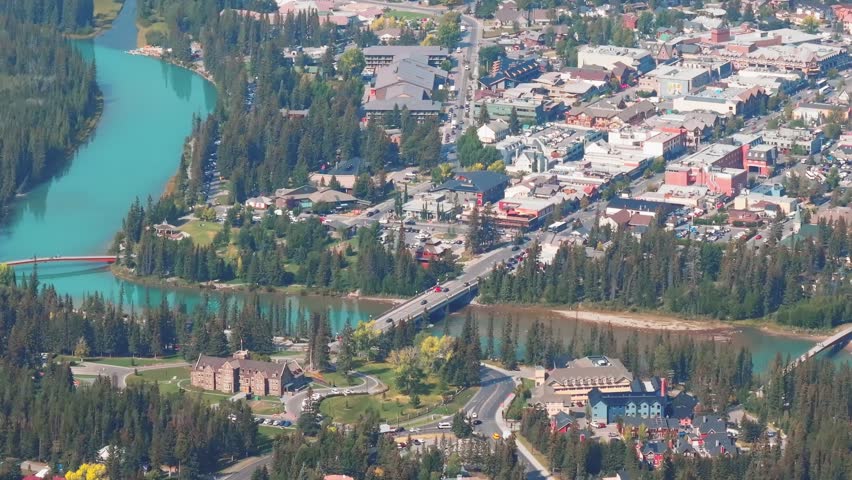 Aerial Revealing shot, Town of Banff, Morning shot. Banff National Park, Alberta, Canada.