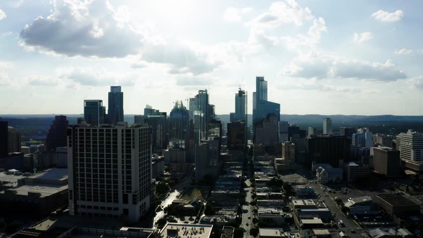 Aerial shot pulling away from the downtown streets of Austin, Texas.