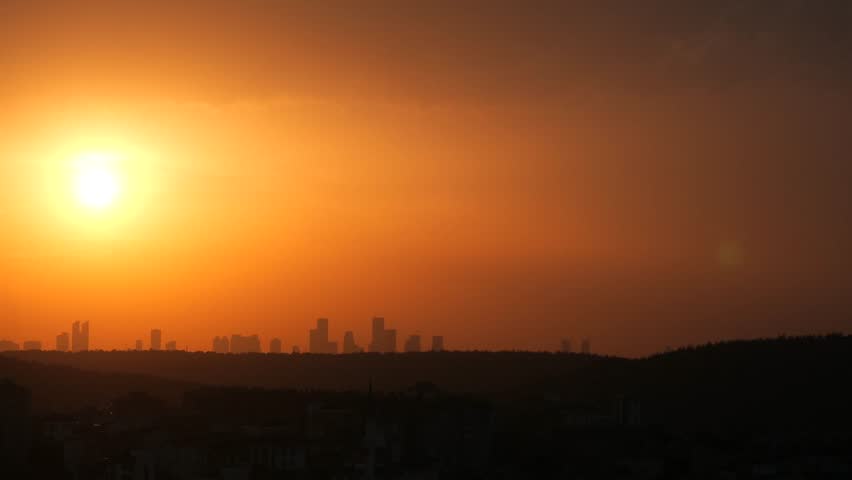 Beautiful sunset over the city skyline at dusk