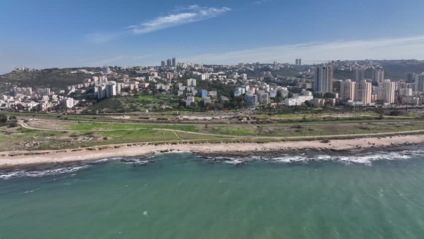 Panoramic Aerial View of Haifa City Skyline and Coastal Promenade Along the Turquoise Mediterranean Sea Shoreline