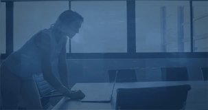 Female analyst leaning over laptop typing and causing pulsing finance waveform numbers for analysis. Woman, boardroom, conference, workstation, data, metrics, modern - Powered by Shutterstock - Get 15% off with code: PIKWIZARD15