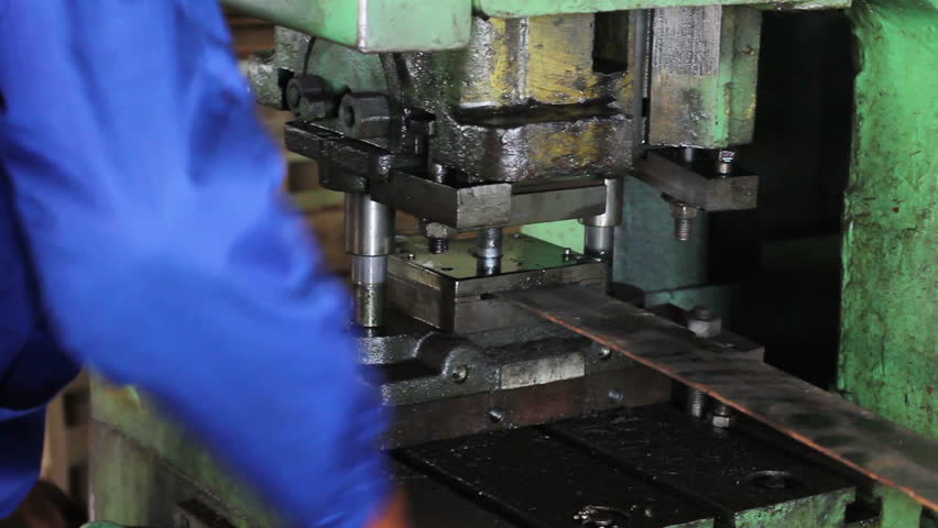 Factory repetitive moves, male stamping holes in iron steel bar