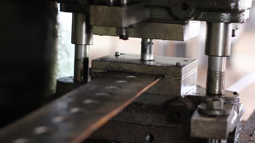 Factory repetitive moves, male stamping holes in iron steel bar