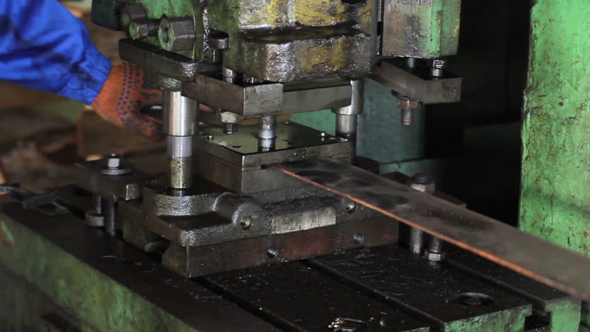 Stamping holes in iron bar machine process