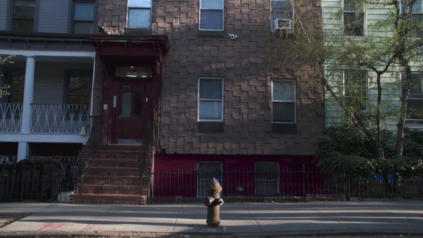 Handheld shot of an apartment building in Greenpoint, Brooklyn. Shot on a spring morning in New York City.