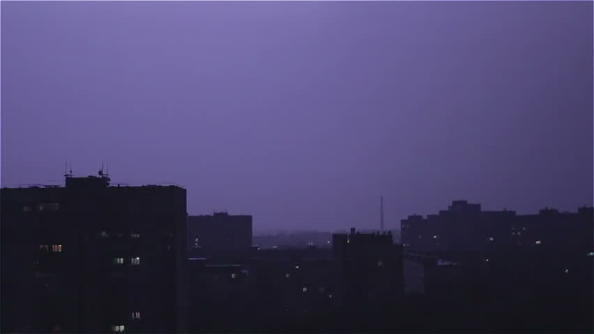Large wide lightning bolt strikes night city, sounds of rain and thunder