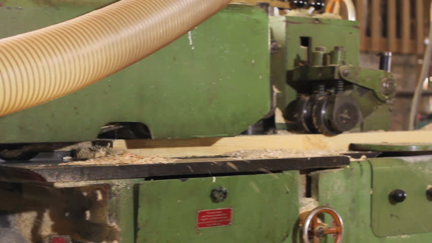 Wood grinding polishing old machine at sawmill factory