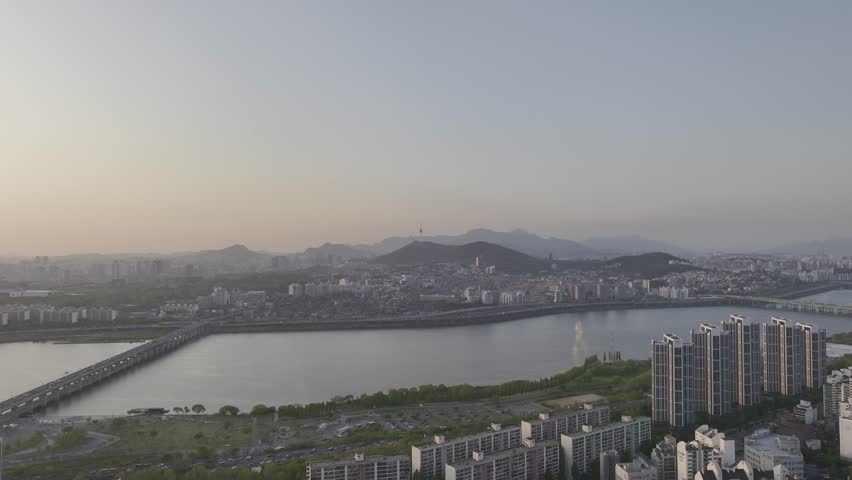 Aerial view of a stunning sunset over the Han River from Banpo, Seoul, with Some Sevit and Moonlight Rainbow Fountain, South Korea.