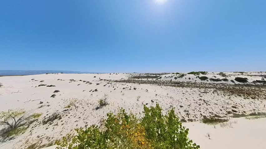 Expansive Dunes of White Sands National Park Under Clear Blue Sky With Wind-Sculpted Ripples And Wide Horizon, New Mexico, United States.