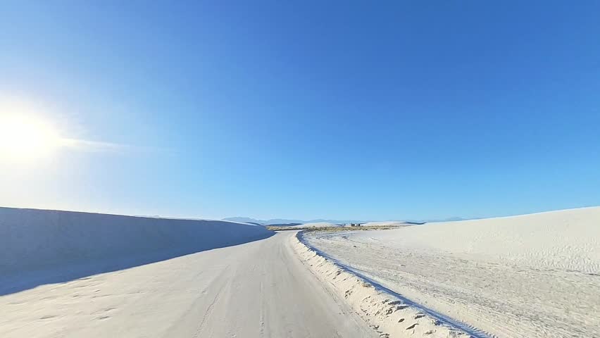 Expansive Dunes of White Sands National Park Under Clear Blue Sky With Wind-Sculpted Ripples And Wide Horizon, New Mexico, United States.