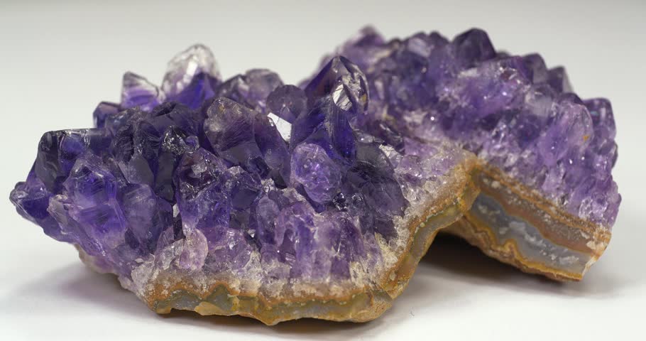 Amethyst gemstones, violet quartz variety often used in rings, necklaces, and jewelry. Violet amethyst crystal, popular semi precious stone for decorative jewelry