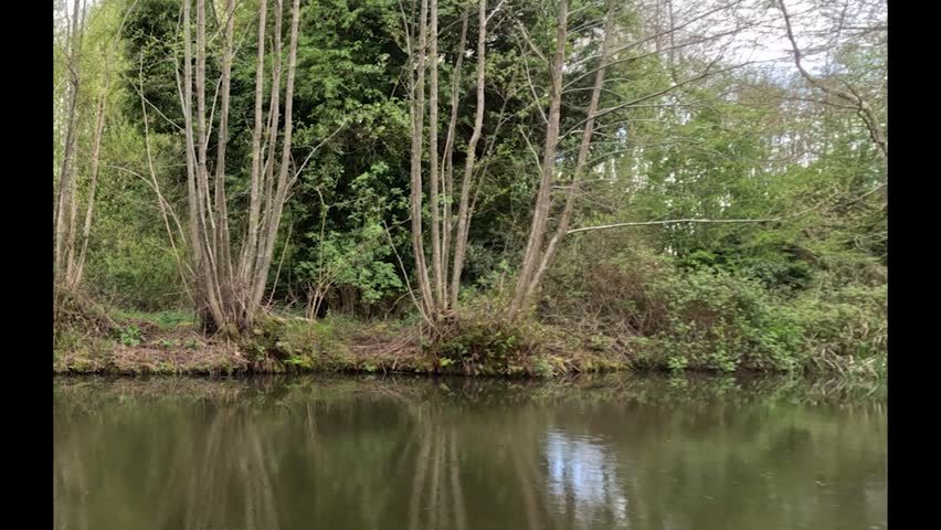walking along the canal looking across the water