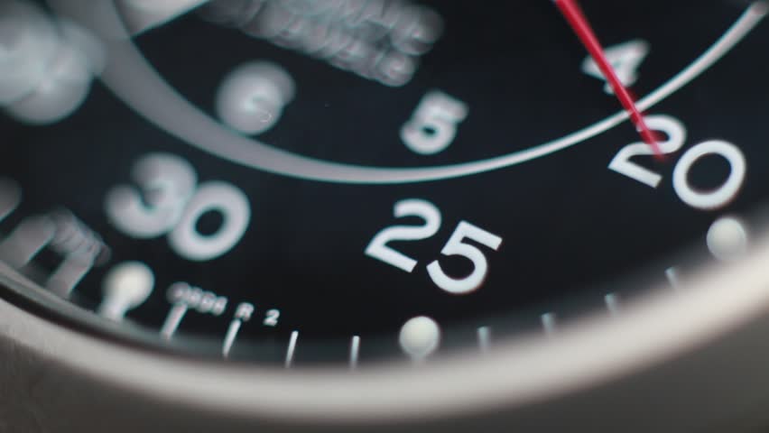 Close up of a fully automatic military watch with ticking hands

