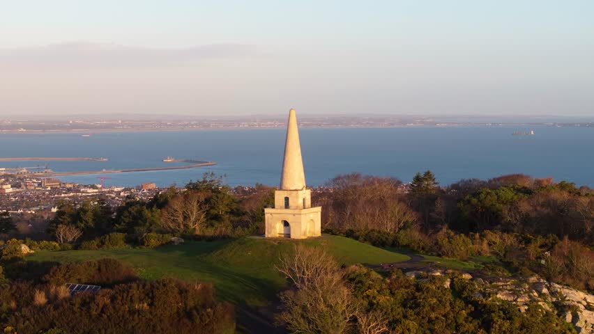 The historic obelisk on Killiney Hill overlooks Dublin Bay and the cityscape. Ideal for historical, architectural, and scenic landscape projects.