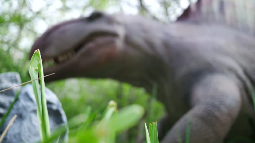 Blurry Dimetrodon Growling in Ancient Wilderness