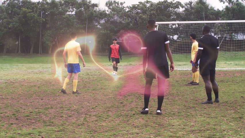 black-kit player winning red pass, dribbling out to counter, pinkgold swirl tracing play for sports. Soccer, dribble, defender, goalkeeper, muddy, overcast, outdoor
