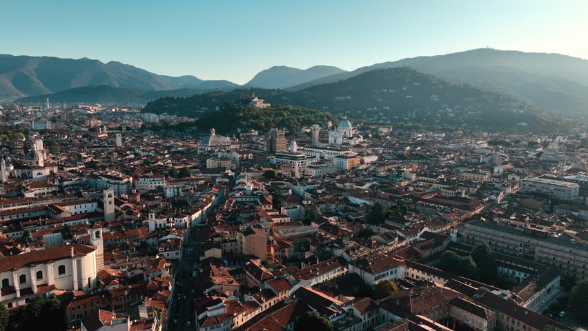 Aerial view of Brescia Italy - old world architecture mixed with modern city living on a summer day