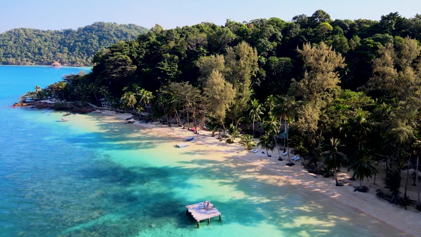 Discover the pristine beaches of Koh Wai Island in Thailand, where soft sands meet crystal-clear waters. Enjoy sunbathing, swimming, and the tranquil beauty of nature in this tropical paradise.