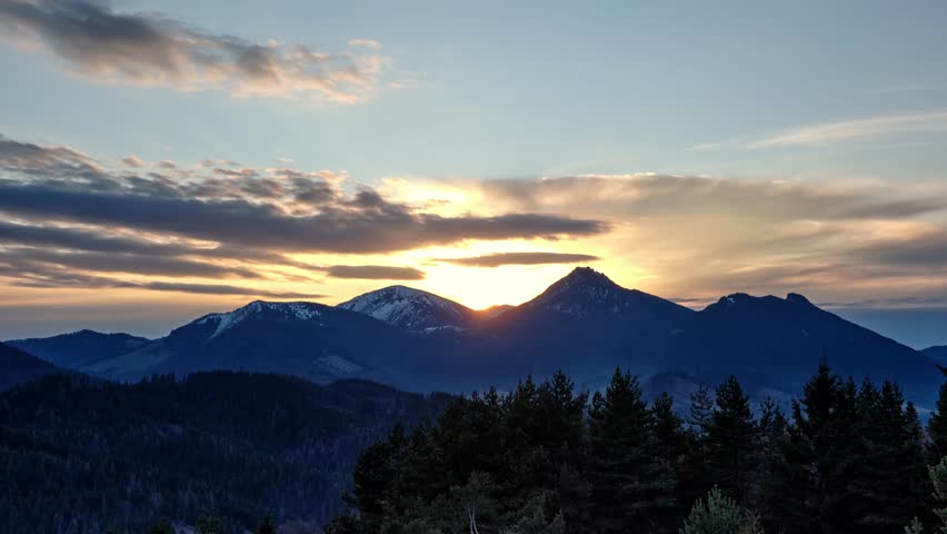 Dusk Mountain Landscape Timelapse with Coniferous Forest Silhouettes