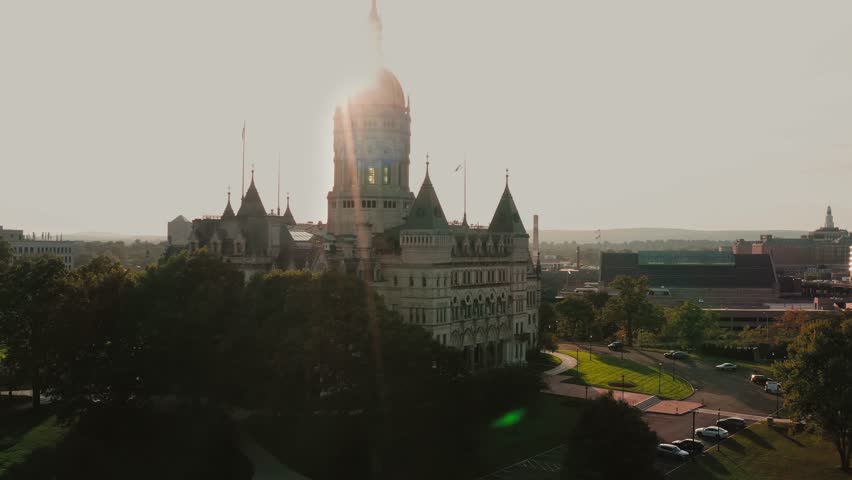 Wide shot of the stately Hartford Connecticut State Capitol Building and surrounding grounds