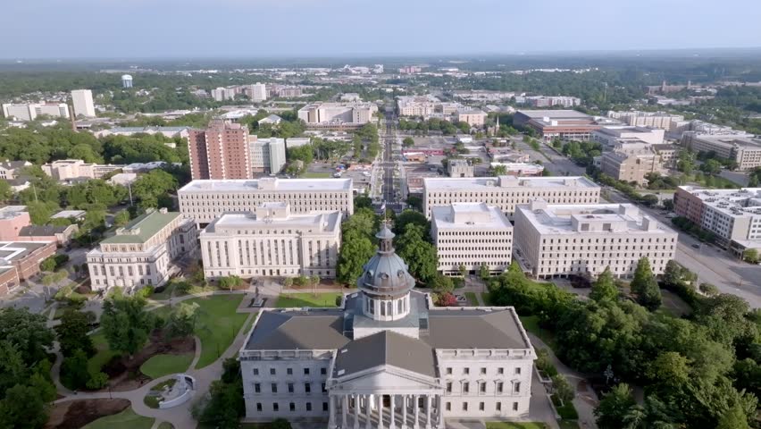 South Carolina state capitol building with drone video moving down slowly.