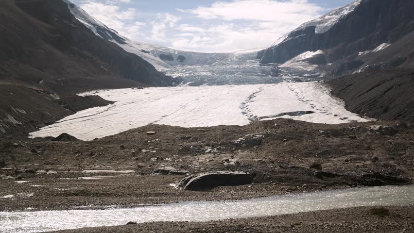Majestic Athabasca Glacier along the scenic Icefields Parkway between Banff and Jasper National Parks, Alberta, Canada. Road trip in Canada. Rocky mountains.
