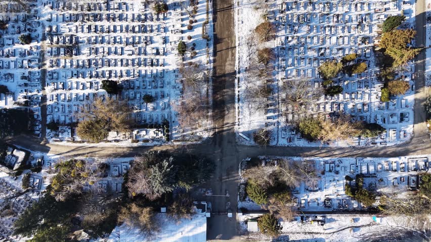 Aerial drone  view of Żwirowa Street Municipal Cemetery in Winter season. Gorzów Wielkopolski. Poland