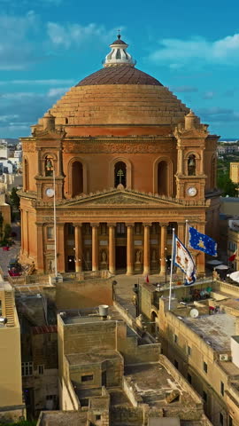  Aerial view of Mosta Church, famous remarkable wartime miracle, architectural landmarks, Malta 