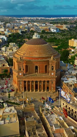  Aerial view of Mosta Church, famous remarkable wartime miracle, architectural landmarks, Malta 